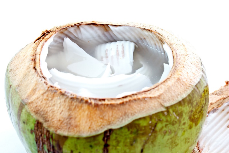 Close up of fresh opened coconut